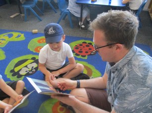 Photo of PF children reading